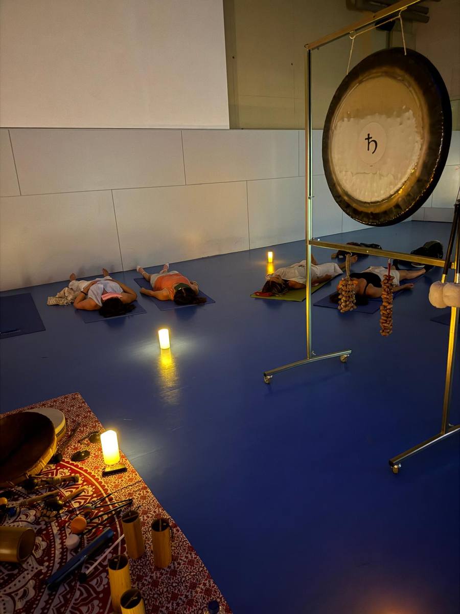 Gong and Tibetan singing bowls session with candles
