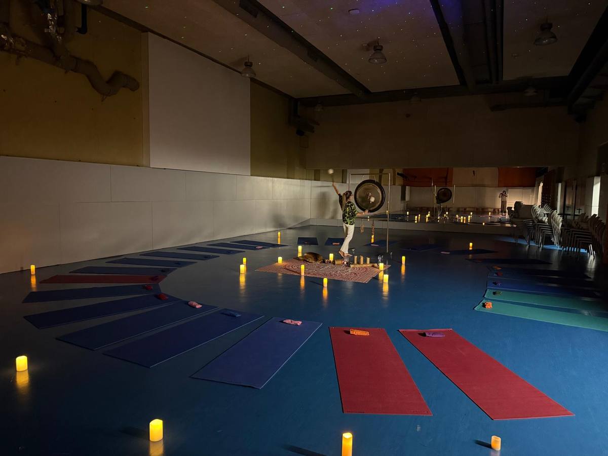 Gong and Tibetan singing bowls session with candles