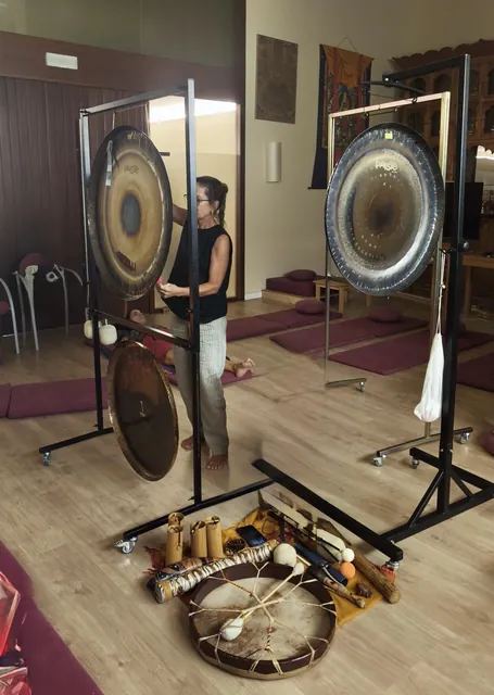 Sound bath session with two planetary gongs, shamanic drum and instruments